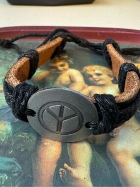 Men’s Black and Brown Leather Peace Sign Bracelet. Adjustable String.